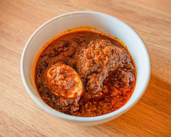 Ethiopia's national dish. Slow-cooked chicken in berbere spice sauce with a hard boiled egg.